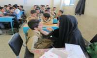 اجرای طرح سلامت دهان و دندان دانش آموزان مدارس ابتدایی در شهرستان آران و بیدگل  